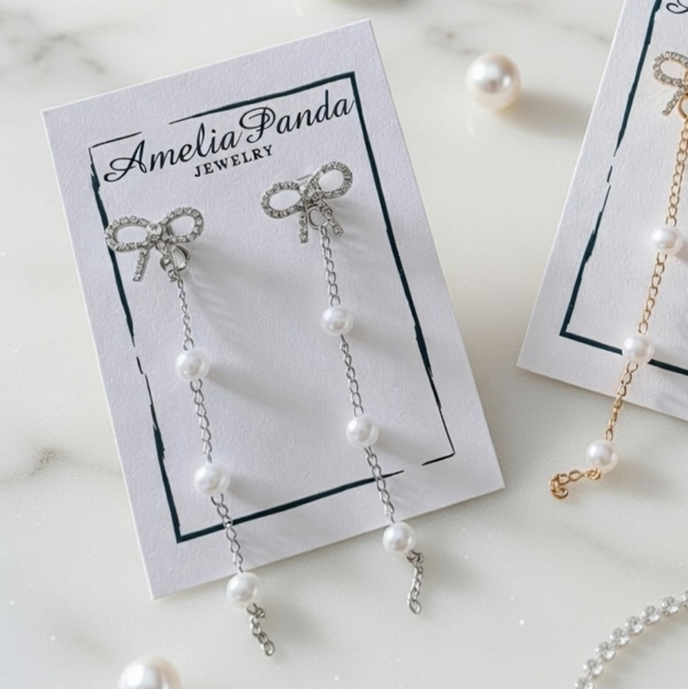 AmeliaPanda Silver Tone Pearl Bow Earrings